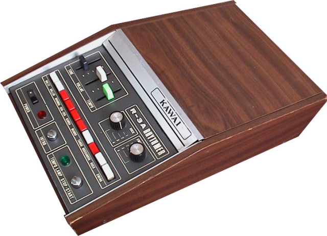Kawai R-3A drum machine, looking like an old portable cassette recorder. Plywood case, metal front plate, funky buttons with a noticable CLACK, when pressed. Kawai R-3A drum machine, looking like an old portable cassette recorder. Plywood case, metal front plate, funky buttons with a noticable CLACK, when pressed.